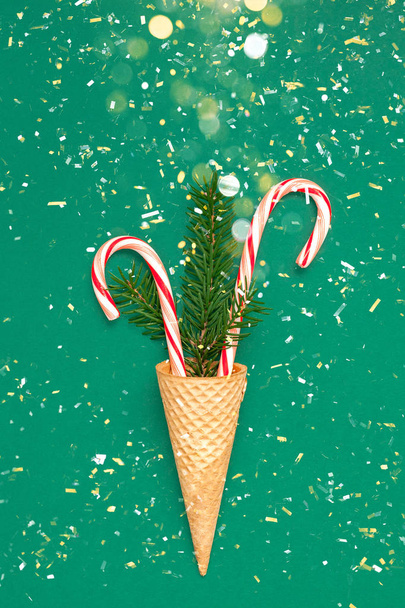 Christmas card with candy canes in waffle cone - Zdjęcie, obraz