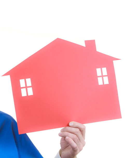 Man holding paper red house model - Φωτογραφία, εικόνα