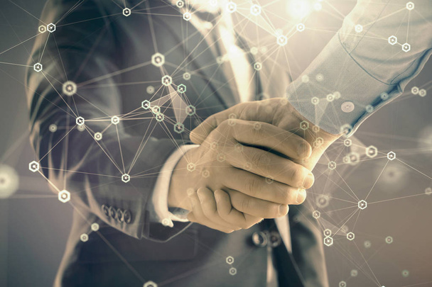 Double exposure of tech drawing on abstract background with two men handshake. Concept of technology in modern business - Φωτογραφία, εικόνα