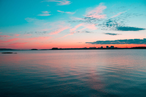 Sunset over calm water - Φωτογραφία, εικόνα
