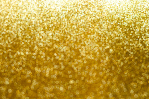 Fondo abstracto brillo oro. Brillo de oro bokeh fondo de Navidad
.  - Foto, imagen