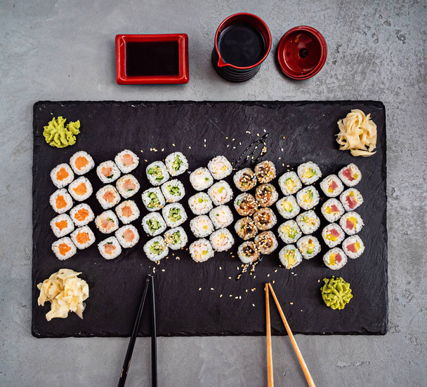 sushi on the black stone, close up - Foto, immagini