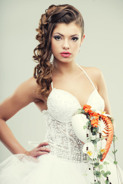 The bride with a wedding bouquet - Fotó, kép