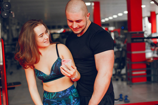 couple in a gym - Photo, Image