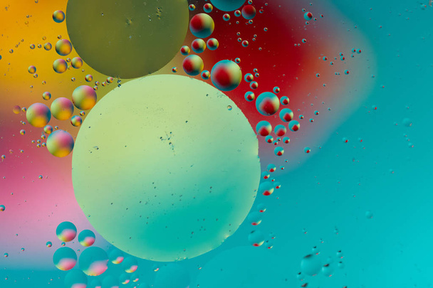 Abstract background, colorful gradient colors. Oil drops in water. - 写真・画像
