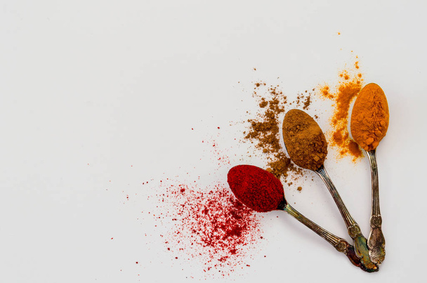 Various spices in spoons isolated on white background. - 写真・画像