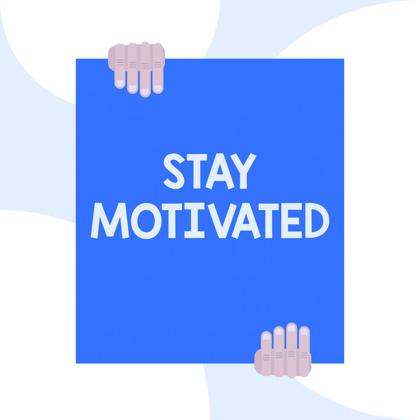Handwriting text writing Stay Motivated. Concept meaning Reward yourself every time you reach a goal with knowledge Two hands holding big blank rectangle up down Geometrical background design. - Photo, Image