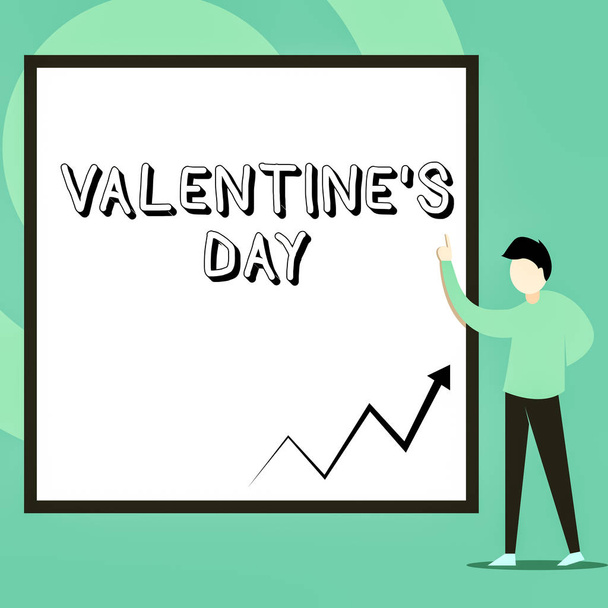 Conceptual hand writing showing Valentine S Day. Business photo text time when showing show feelings of love and affection Man standing pointing up blank rectangle Geometric background. - Photo, Image