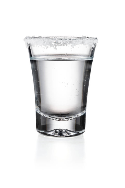 Tequila in a glass with salt isolated white background - Photo, Image