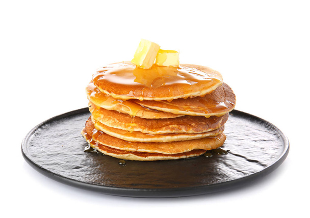 Plate with tasty pancakes on white background - Photo, Image