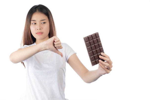 Women who are against chocolate,isolated on a white background. - Foto, immagini
