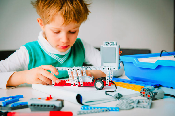 child building robot at robotic technology school lesson - Photo, Image