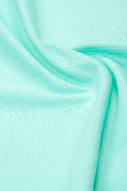  Textura, pozadí, vzorek. Tkanina je pletená modrá, turqu - Fotografie, Obrázek