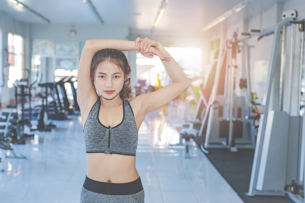 Girl playing fitness in the gym. - 写真・画像