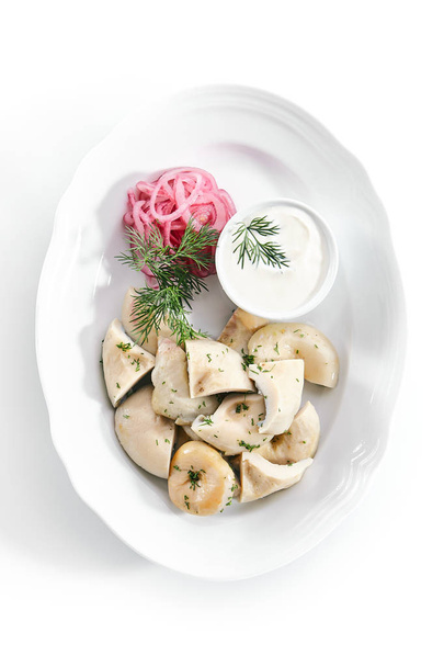 Pickled Milk Mushrooms, Marinated Red Onion Rings and Sour Cream - Фото, зображення