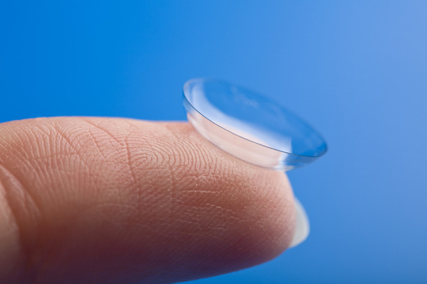 Finger holding contact lens - Photo, Image