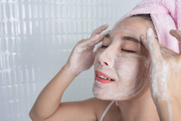 Asian girl washes face. - Photo, Image