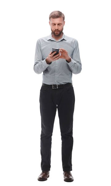 handsome well dressed business man surfing internet on smart phone - Photo, image