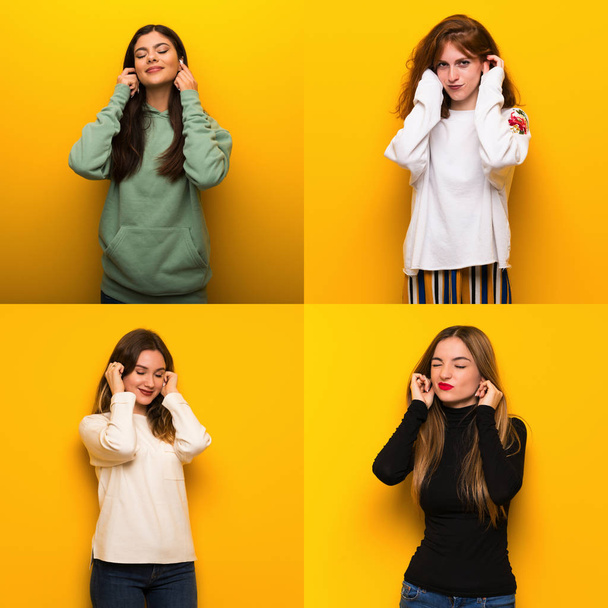 Set of women over Yellow background covering ears with hands. Frustrated expression - Photo, Image