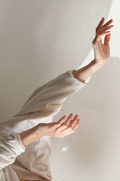 Calming movement of female's thin soft hands - Foto, Bild