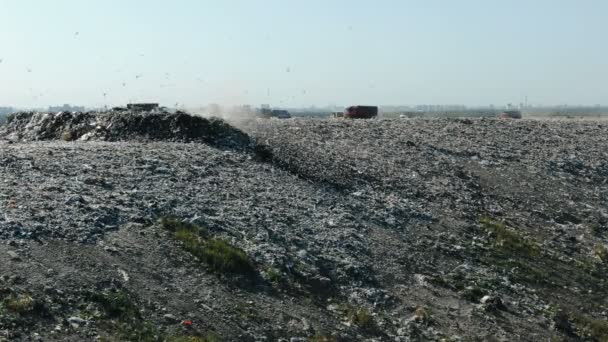 City dump aerial view, a convoy of trucks carries debris to a landfill - Footage, Video