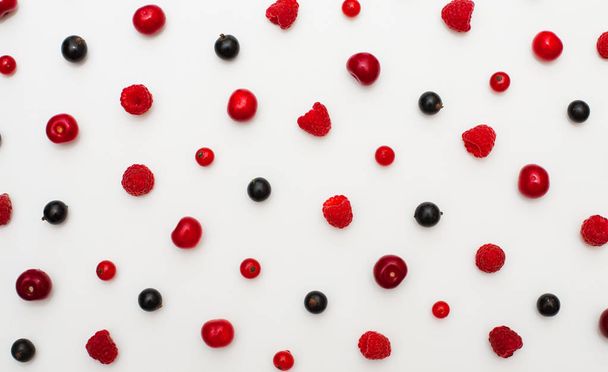 Many different fresh berries isolated on white background - Foto, Bild