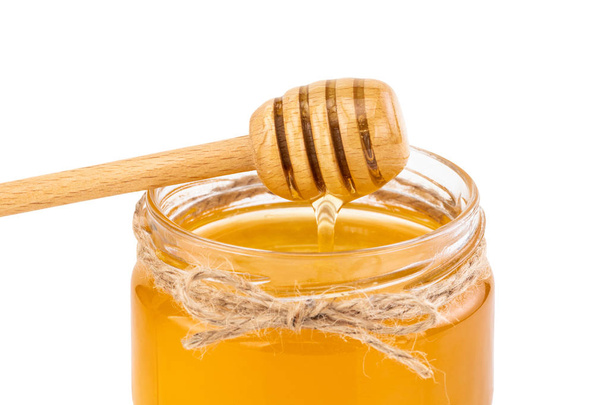 Olla de miel y cazo aislados sobre fondo blanco - Foto, Imagen