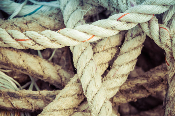 Nautical background of old frayed boat rope - Фото, изображение