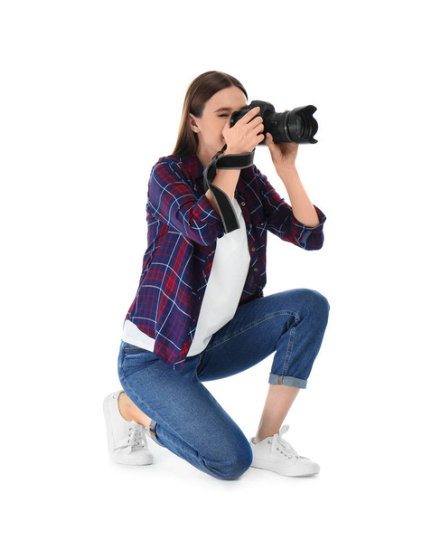 Professional photographer taking picture on white background - Foto, imagen