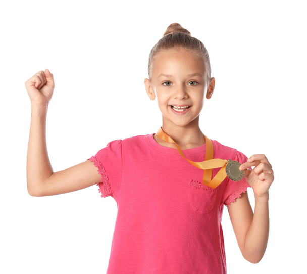 Happy girl with golden medal on white background - Foto, Imagem