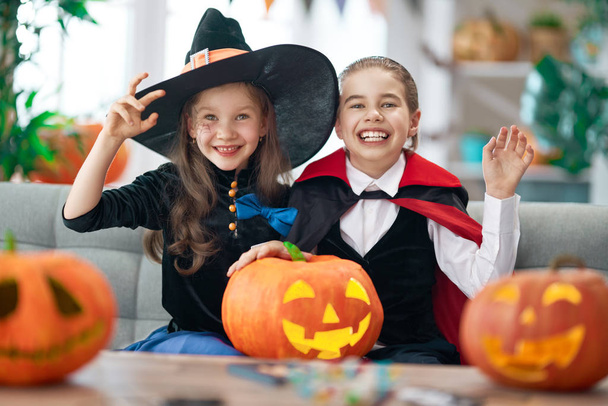 kids with carving pumpkin - Photo, image