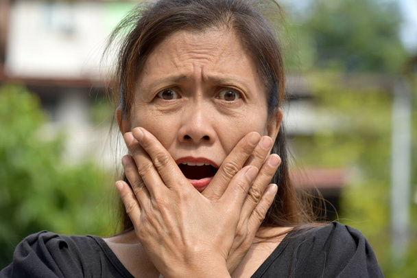 A Startled Filipina Female Senior - Foto, imagen