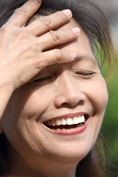A Retired Asian Gramma Laughing - Фото, изображение