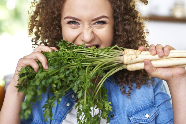 Big bite of organic parsley - Photo, Image