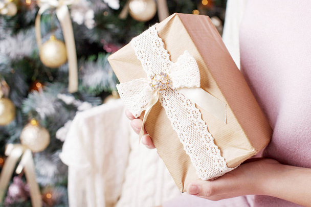 Child's  hands holding gift box. Christmas, hew year, birthday  - Zdjęcie, obraz