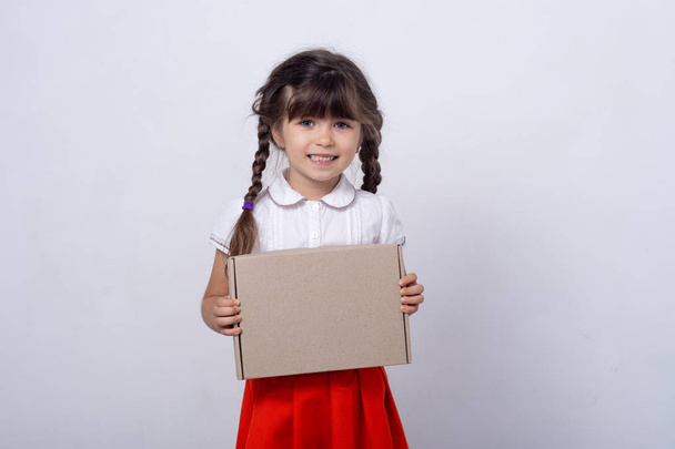 Free shipment, sale. Happy little kid son with cardboard box. Cute child toddler clients receiving carton package. Post mail parcel delivery service concept.  - Photo, Image