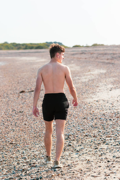 Shirtless on a beach - Foto, Imagem