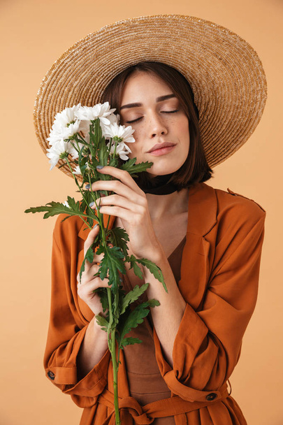 Beautiful young woman wearing straw hat - Zdjęcie, obraz
