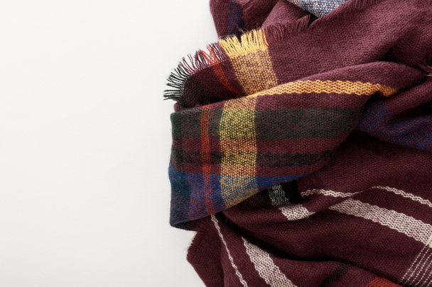 top view of burgundy wool plaid scarf on white background - Photo, Image