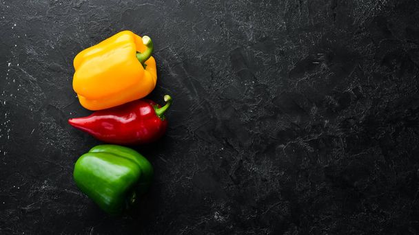 Sweet colored bell pepper. Fresh vegetables. Top view. Free space for your text. - Φωτογραφία, εικόνα