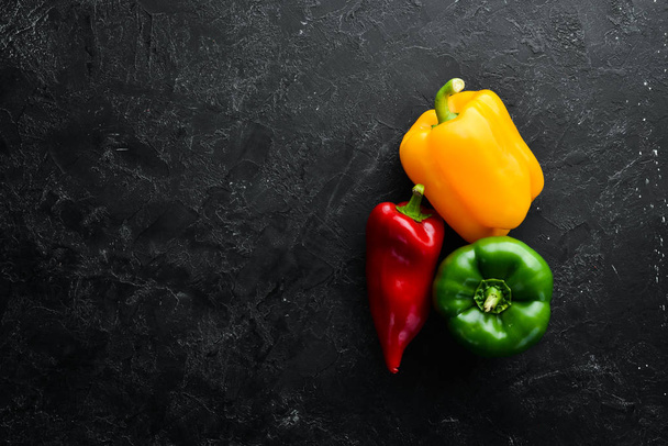 Sweet colored bell pepper. Fresh vegetables. Top view. Free space for your text. - Photo, image