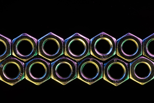 seamless metal screws pattern isolated on black - Fotó, kép