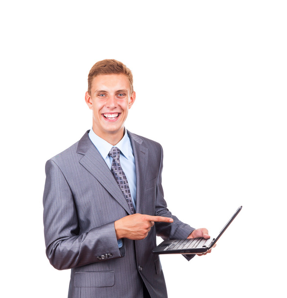 Businessman hold laptop point finger gesture - Foto, Bild