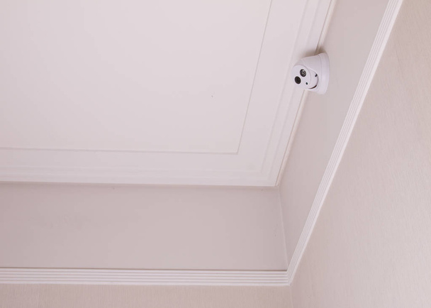 CCTV camera in the house on the ceiling. - Photo, image
