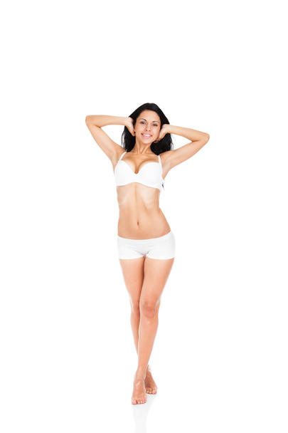 Beautiful woman smile posing full length isolated over white background - 写真・画像