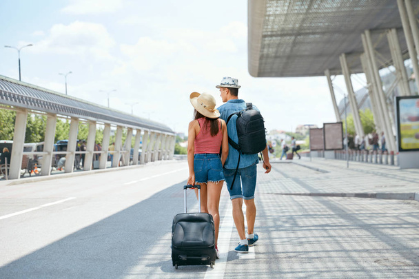 Travel. Couple Near Airport With Suitcase Traveling In Summer - Fotó, kép