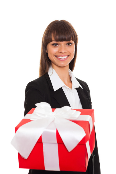 Business woman happy smile hold gift box in hands - Фото, изображение