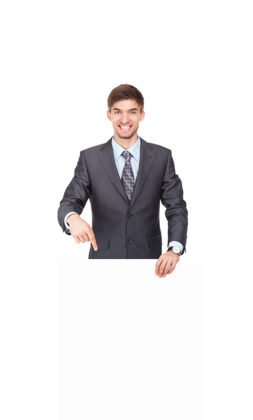 Businessman holding a blank white card board - Photo, Image