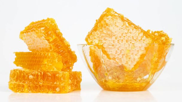 honeycomb on white background. Healthy and vitamin foo - Фото, изображение