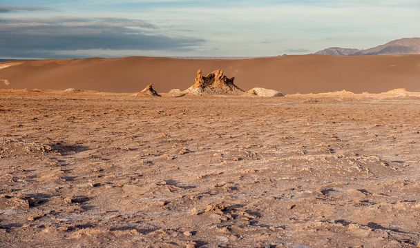 The Three Mary (Las tres marias ) in sunrise at Valle de la Luna Moon Valley, San Pedro de Atacama Chile. Wide view of stunning sun rise on sand formation in world famous Atacama desert Chile. Salt formations at Valle de la Luna spanish for Moon Vall - Photo, Image
